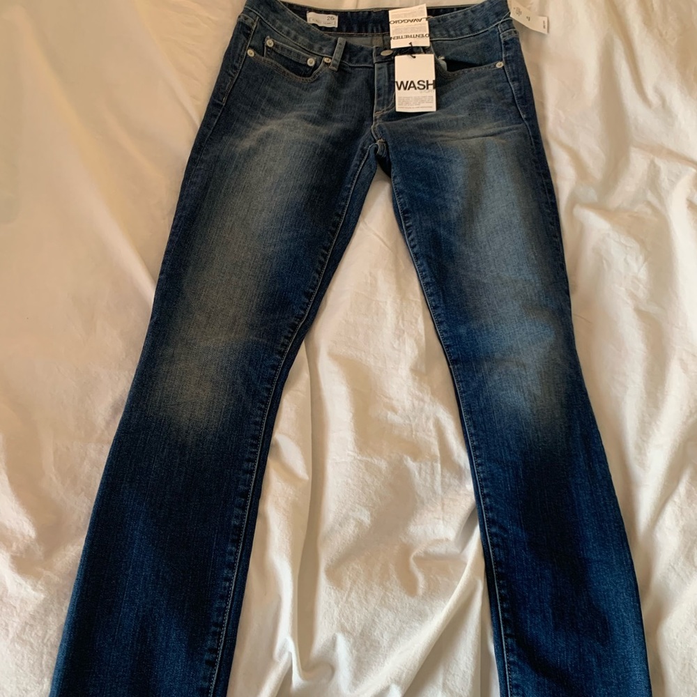 Skinny dark stretch mid rise denim